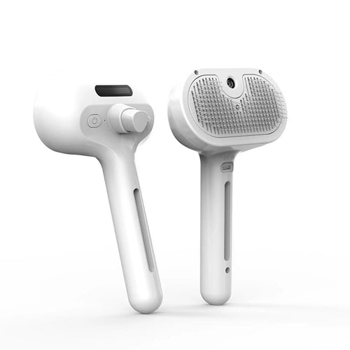 Electric pet grooming brush with steam spray feature for dogs and cats