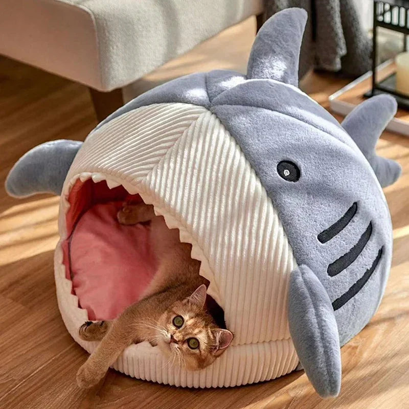 Gray shark pet bed showing interior cushion and padding